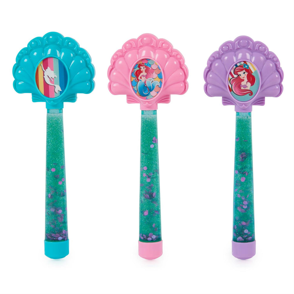 Three colorful dive toy wands with shell designs featuring Ariel.