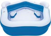 Inflatable children's blue and white pool with two small triangular seats inside with headrests. Next to both headrests is a small hole for a water bottle or cup. 