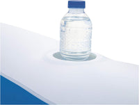 Clear water bottle with blue cap sitting in the cupholder with plenty of room.