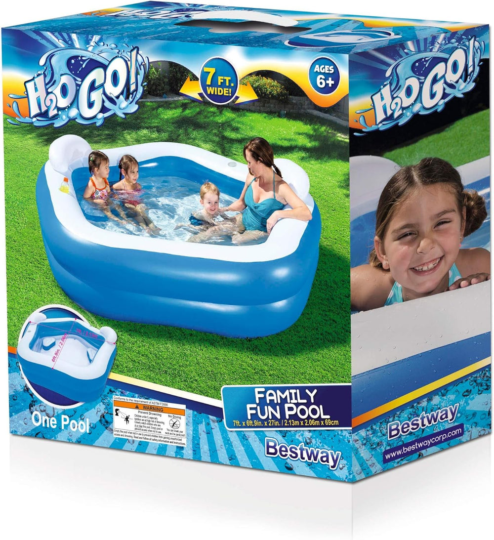 Box of Bestway inflatable blue and white family pool. The picture features one adult woman and three children sitting comfortably inside the pool/